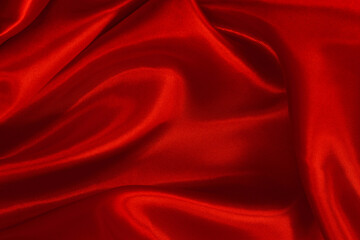 Dark red fabric texture background, detail of silk or linen pattern.