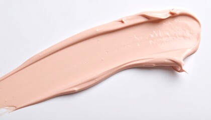 Pale pink cream swatch, smoothly textured, on white background