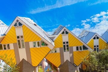 Discover the Cube Houses of Rotterdam, an iconic architectural landmark in the Netherlands. These uniquely tilted houses attract tourists and architecture lovers for their vibrant design.