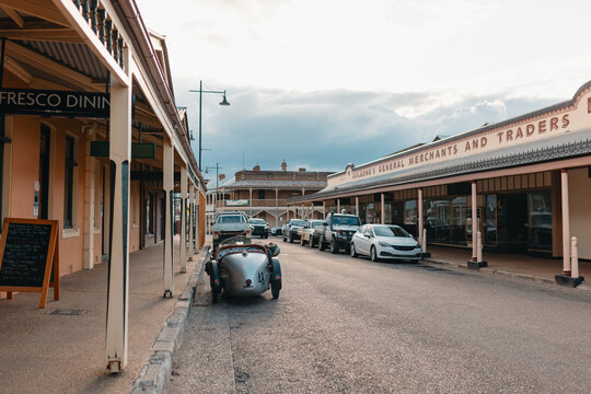 Fototapeta Austin 7 Special vintage car parked outside rural country pub in Gulgong NSW