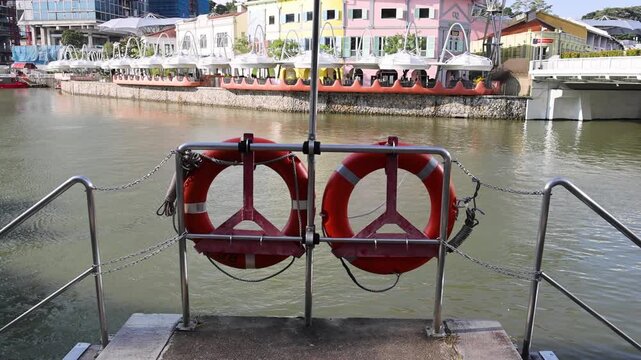 Lifebuoys Overlooking Riverside Steps at Clarke Quay Singapore