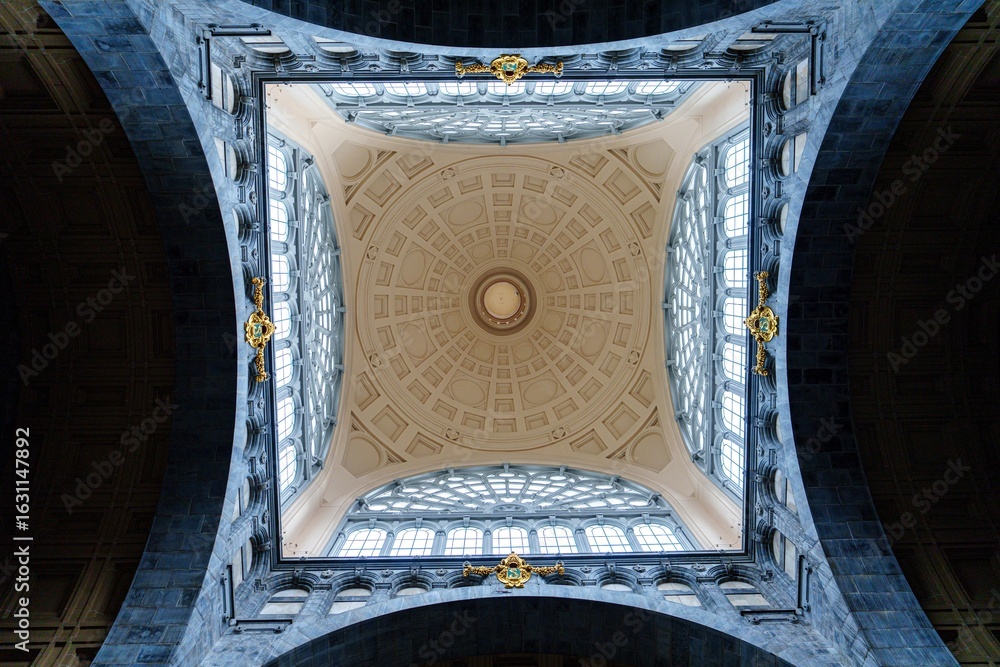 Poster an upward view of a beautifully designed dome ceiling featuring intricate patterns. natural light fi