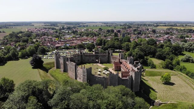Flying over drone shot of Framingham Castle and showing the town of Framingham which it overlooks in, Suffolk, UK. 21.06.25