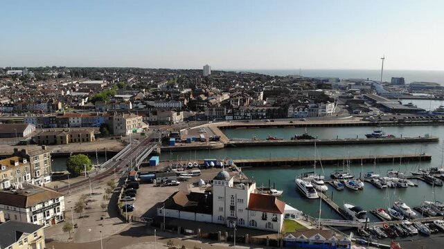 Low flying drone shot showing Lowestoft Marina and the town of Lowestoft in Suffolk, UK. 21.06.25