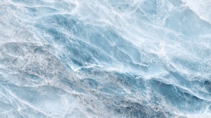 Obraz premium Stunning blue ice formations create a mesmerizing texture, reflecting light beautifully. The image showcases the intricate patterns carved by nature in a glacial environment.