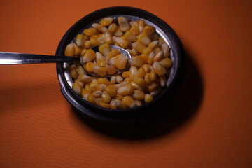 Sweet Corn : Corn kernels are small maize fruits containing a hard shell, dense starch-filled endosperm, and embryo germ essential for growth