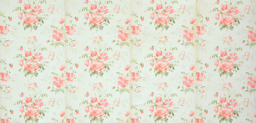 Old wallpaper on the wall. Old wallpaper for texture or background.