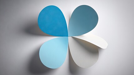 Colorful paper flower design against a plain background.