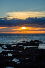 Dramatic Sunset and Colorful Clouds over the Pacific Ocean in Kona, Hawaii