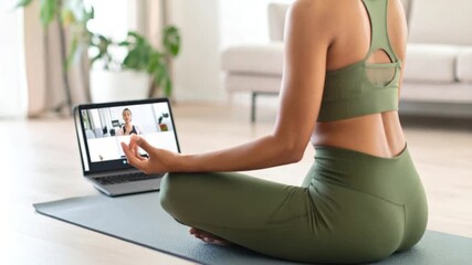 Woman online yoga session