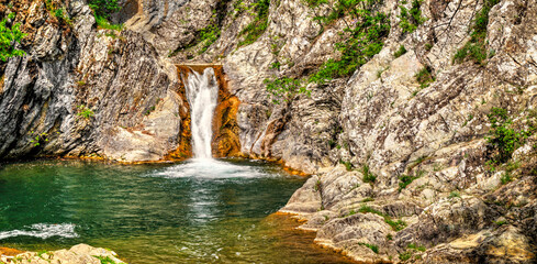 Beautiful landscape with waterfall in the mountain