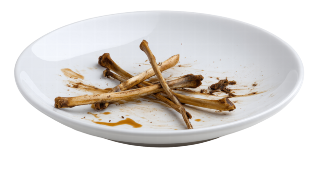 Eaten bone empty plate isolated transparent background leftover food white plate dirty meal dish bone rib bone cooked grilled