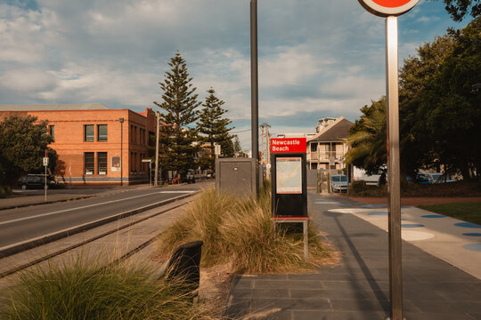Light rail stop along street at Newcastle Beach