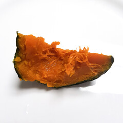  A series of images showing pieces of steamed pumpkin. The photos highlight the soft, flaky texture...