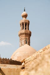 Fototapeta premium Towering minaret of mosque in old Cairo, Egypt