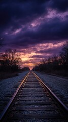 Fototapeta premium Twilight railroad track, dramatic sky