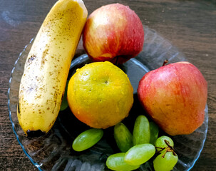 Assorted Fresh Fruits on a Glass Plate