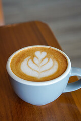 Cafe Latte with Oat Milk, Indonesia, captured on August 6, 2025. A warm oat milk latte served in a ceramic cup, creamy and smooth, perfect for a cozy café moment with natural light on a wooden table