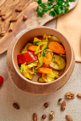 A Delicious Array of Freshly Cooked Vegetables Featuring Vibrant Carrots, Cabbage, and Bell Peppers, Perfect for a Healthy Meal Option