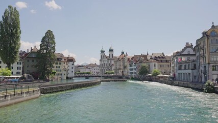 Reuss River with Jesuit Church in Lucerne.Captured on July 17, 2025