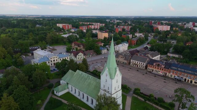 Aerial Panorama of Dobele Town Center and Evangelical Lutheran Church at Summer Scenic Drone View in Golden Hour Light Over Dobeles Historic Center on a Warm Summer Evening Peaceful Latvian Town