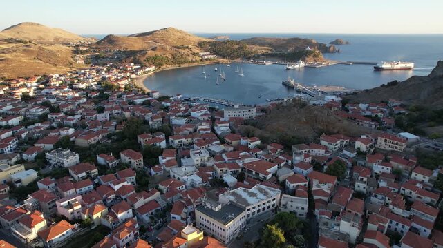 Myrina Limnos Aerial Dolly Panoramic View of City Center and Ferry Arriving at Port
