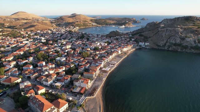 Aerial View of Myrina Limnos Island, Romeikos Gialos, City Center and Castle View, Dolly Shot at Dawn