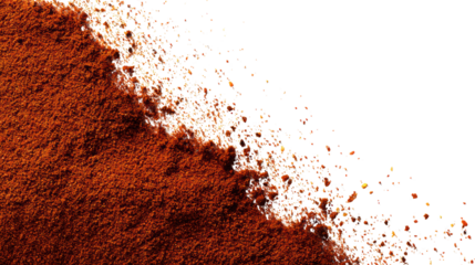 Ground spice, rich brown color, texture variations on a black background.