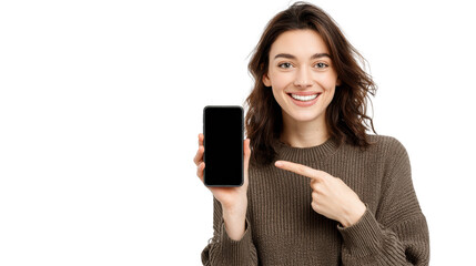 Happy young woman presenting smartphone, smiling, casual attire, isolated background.