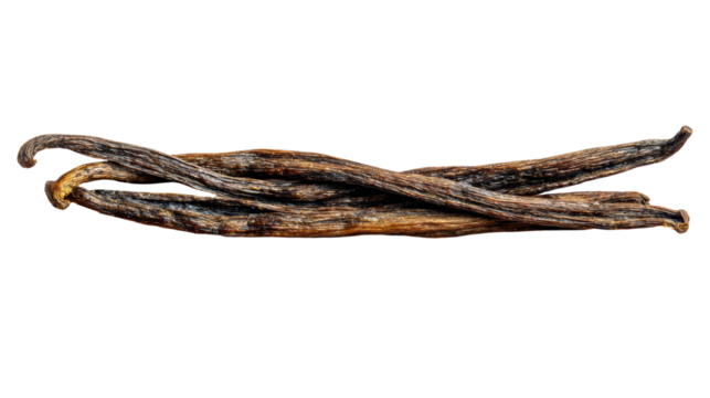 Organic vanilla pods arranged on a white isolate background.
