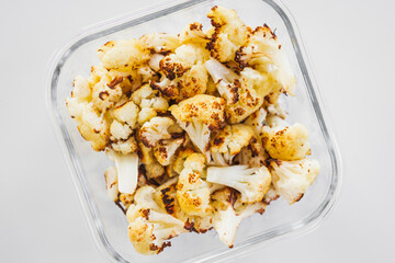 roasted cauliflower in glass container for healthy meal prep