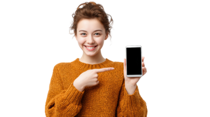 Smiling woman in cozy sweater showing smartphone with blank screen, isolated on white background.