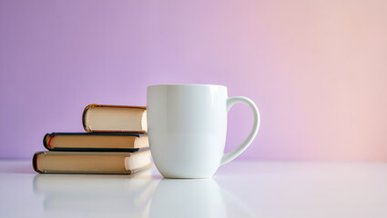 Cozy reading scene with stacked books and white mug