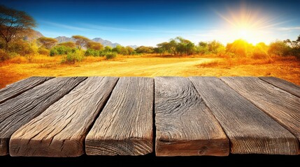 Sunlit rural landscape with wooden planks in the foreground and open field under a bright sky