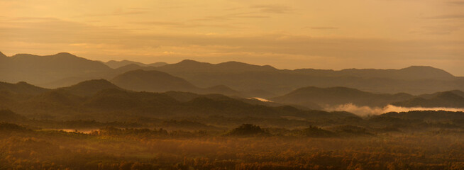 Banner Beautiful Mountain landscape foggy mountain green landscape morning sunrise. Amazing...