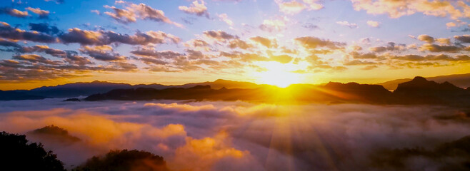 Banner Golden sky sunrise dramatic beautiful landscape view. Dawn sky gold dusk time cloudscape...