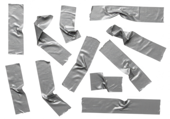 Collection of torn and crumpled silver duct tape strips isolated on transparent background