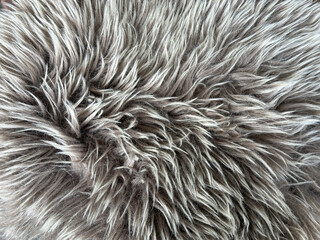 Close-up of gray faux fur texture.