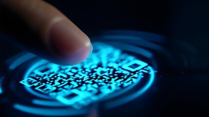 Close-up of a finger hovering above a glowing QR code on a digital screen, symbolizing technology and connectivity.