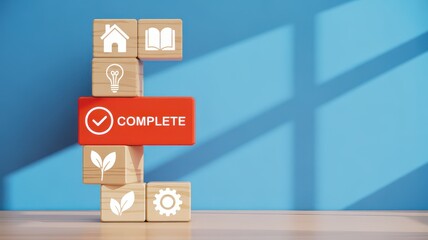 Business process and project completion concept. A stack of wooden blocks with icons representing stages culminating in success.