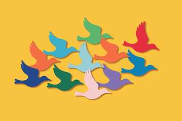 A collection of colorful paper birds flying together on a yellow background in a minimalist style art