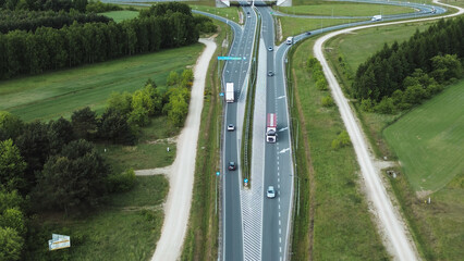 Freight truck driving along modern highway