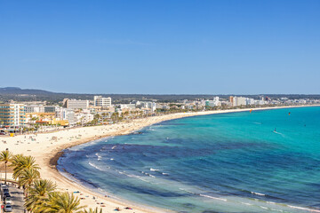 Aerial view at the beach in Can Pastilla on Mallorca with tourists on the beach