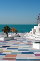 Fototapeta premium Coastal Promenade with Colorful Tiles and Ocean View