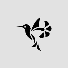 Elegant hummingbird logo with a floral tail, a nature-inspired bird silhouette icon