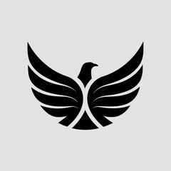 Elegant black bird logo design with majestic wings spread wide