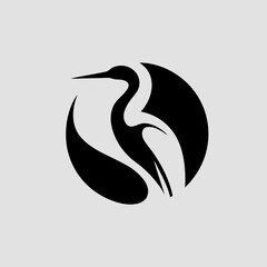 Elegant heron bird logo design with a stylized circular silhouette