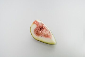 A Slice of Fig on White Background