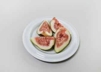 Sliced Figs on a White Plate