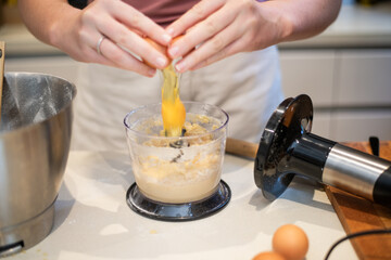 young woman baking in home kitchen